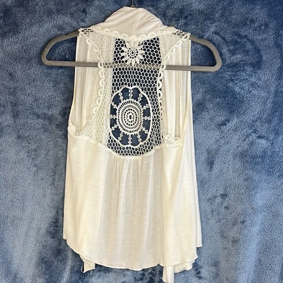 Body Central - Draped Sleevless Open Front Cardigan 

This is a fun and flirty! - Picture 2 of 3